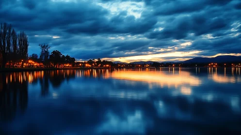 Twilight lakefront panorama captures luminous urban reflections
