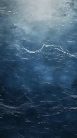 Soft stormy sea under misty light, quietly unfolding.