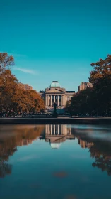 Symmetric neoclassical facade with reflective pool axis study.