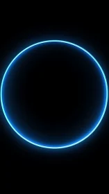 Soft neon blue circle glowing gently in the dark night.