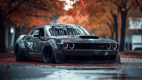 Widebody muscle car dominates wet autumn street scene.