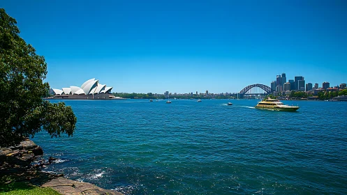 Sydney Opera House with Harbour Bridge and Ferry, Midday Clear Sky.