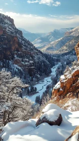 Snowlit canyon river winding through winter mountain hush.