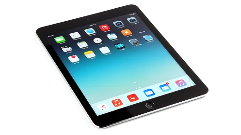 iPad Tablet Device with App Icons and Home Screen.