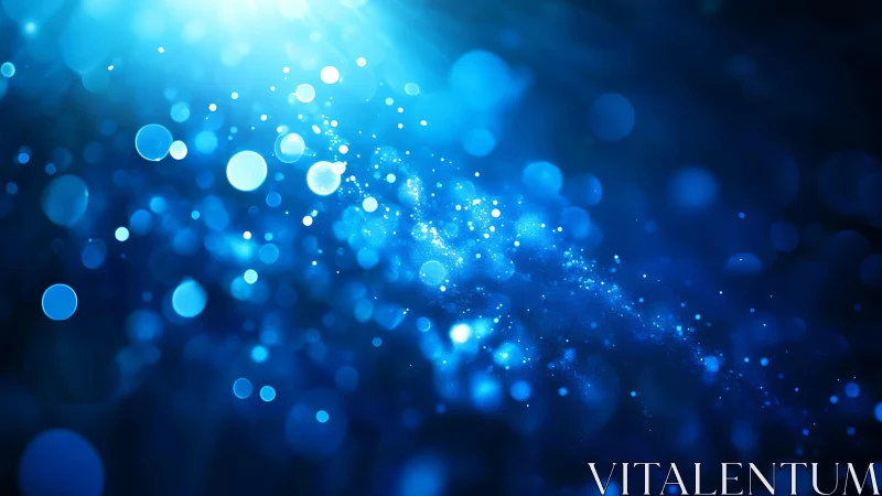 Abstract blue bokeh lights with glowing particles and soft blur.