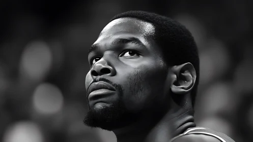 Monochrome courtside portrait in cinematic close-up framing.