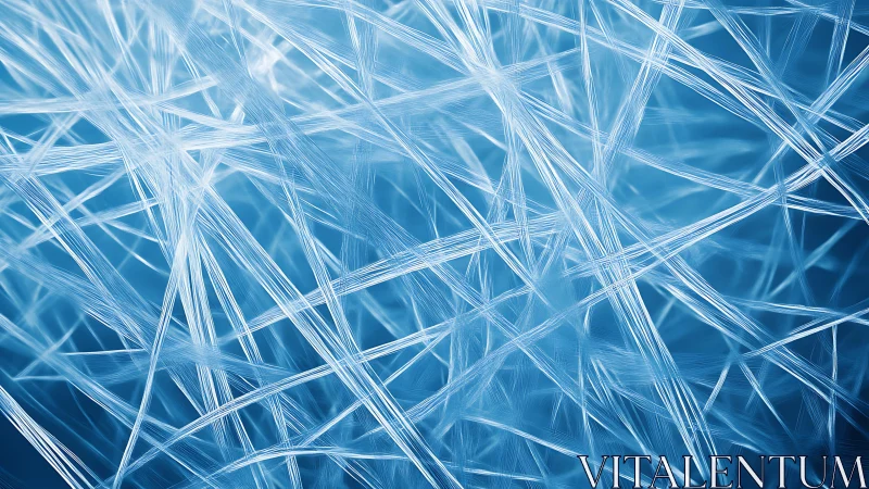 Abstract close-up of blue and white intersecting fiber lines pattern.