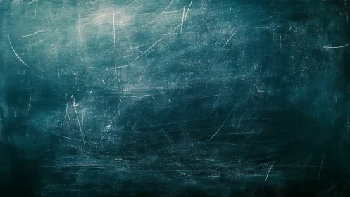 Aged teal chalkboard surface reveals dense abrasion network