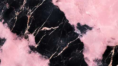 Rose quartz veining across deep obsidian marble surface.