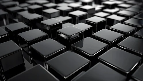 Glossy black cubic forms create a dense, uniform surface grid