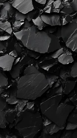 Midnight shale cascade of shattered obsidian dreams.