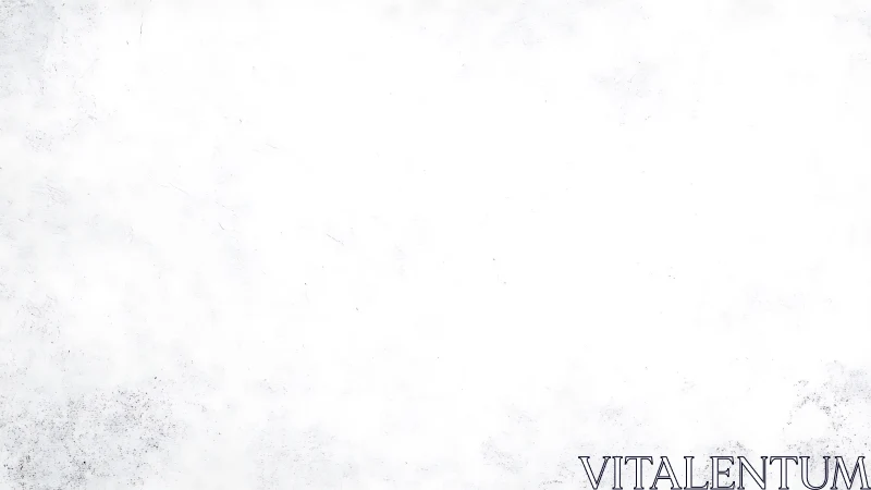 White textured surface with faint gray speckled patterns.