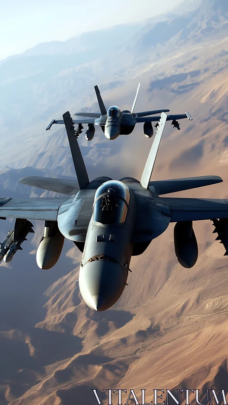 Twin modern fighter jets in tight formation over desert range.