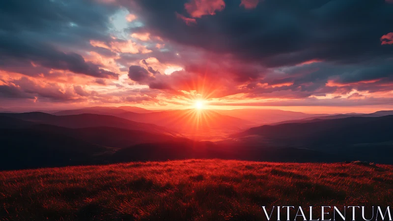 Sun aligns centrally over layered hills at low horizon line