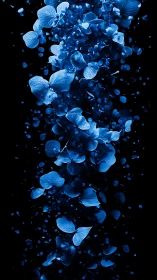 Multiple blue petals descend vertically against black background