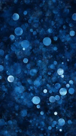 Blue bokeh spheres drift across deep textured night field
