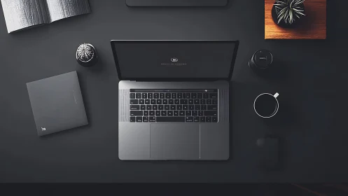 Minimalist workspace frames sleek laptop and dark desk layout.