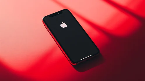 Red iPhone on Gradient Background. Minimalist Product Shot.