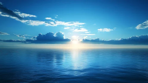 Calm ocean horizon under radiant blue sunrise sky.