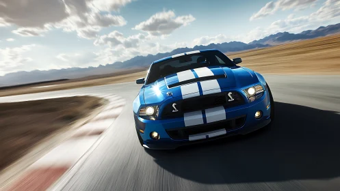 Blue striped performance car navigates curved desert track