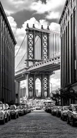Monochrome street perspective framing steel suspension bridge