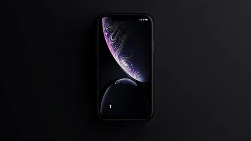iPhone XR with Purple Swirl Wallpaper and Dark Background.