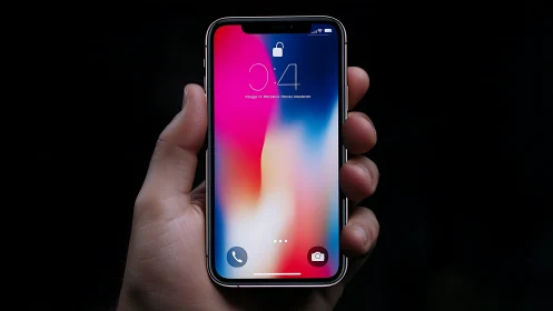 Smartphone displaying lock screen with gradient background.
