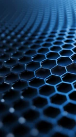 Blue hexagonal grid forms glossy curved metallic surface.