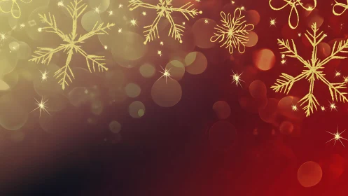Golden snowflakes glow over soft red holiday bokeh background