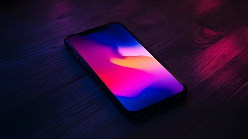 Modern smartphone displaying vibrant gradient wallpaper with neon colors