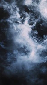 Billowing pale smoke drifts across a deep black void.