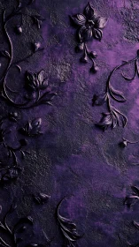 Embossed purple floral relief over textured dark plaster.