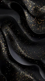 Black curved surface with dispersed gold particle overlay