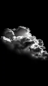 High-contrast cumulonimbus cloud under deep black void.