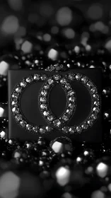 Black jeweled interlocking rings on luxury clutch centerpiece.