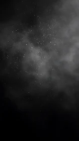 Soft stardust drifting through a quiet midnight sky.