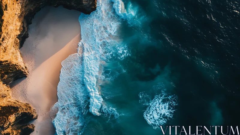Aerial shoreline with breaking waves against golden sea cliffs