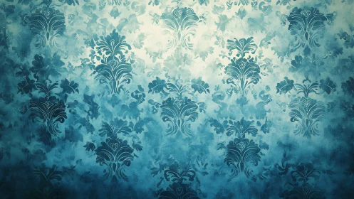 Blue damask wallpaper pattern with soft textured gradient.