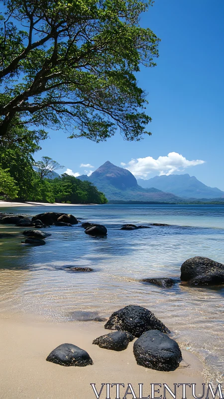 Volcanic Peak Rising Beyond Pristine Tropical Beach.