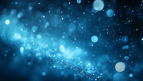 Blue bokeh particle field with shallow depth of focus.