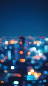 Defocused city skyline with colorful urban night lights.