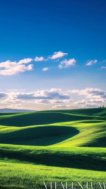 Sunlit green hills rolling beneath vivid blue sky glow.