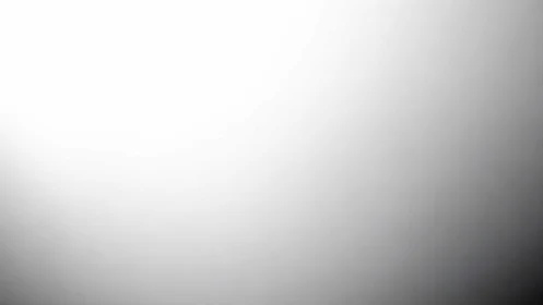 Soft grayscale gradient gently drifting from light to shade