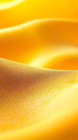 Golden micro dunes of fabric glowing in soft sunlit hush.