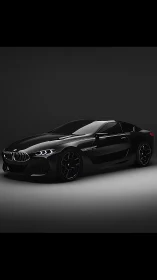 Black BMW coupe in studio setting under low key lighting.