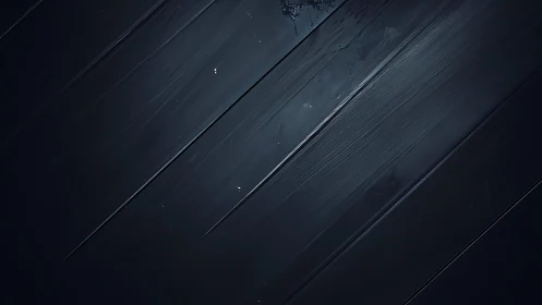 Dark abstract painted texture with diagonal brush strokes.