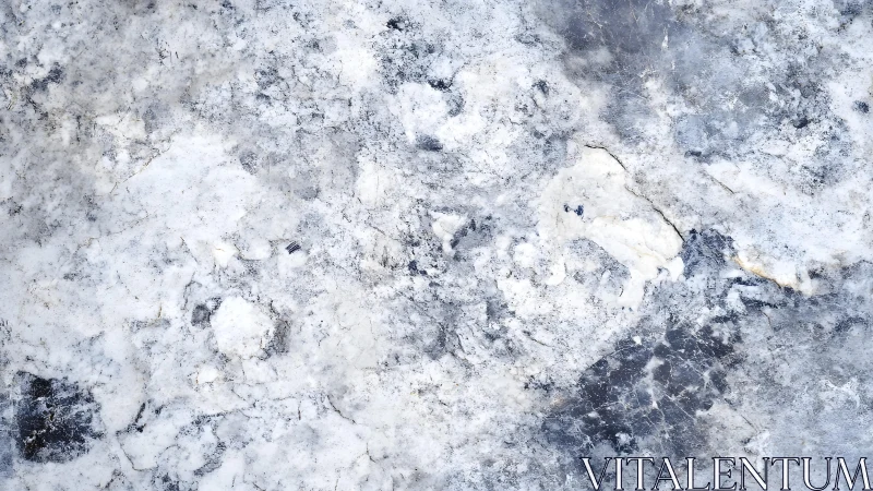 Abstract close-up of textured white and grey marble stone surface.