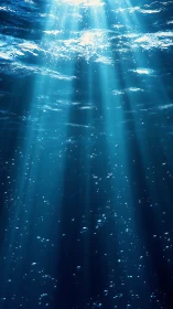 Sunlit ocean depths reveal descending beams and bubbles