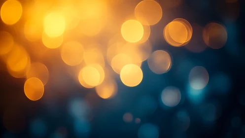 Warm golden bokeh lights on dark blue background, abstract style.