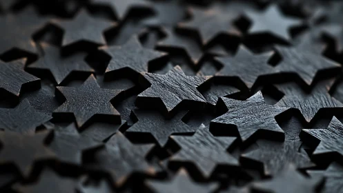 Layered wooden stars rest in a calm, shadowy cluster